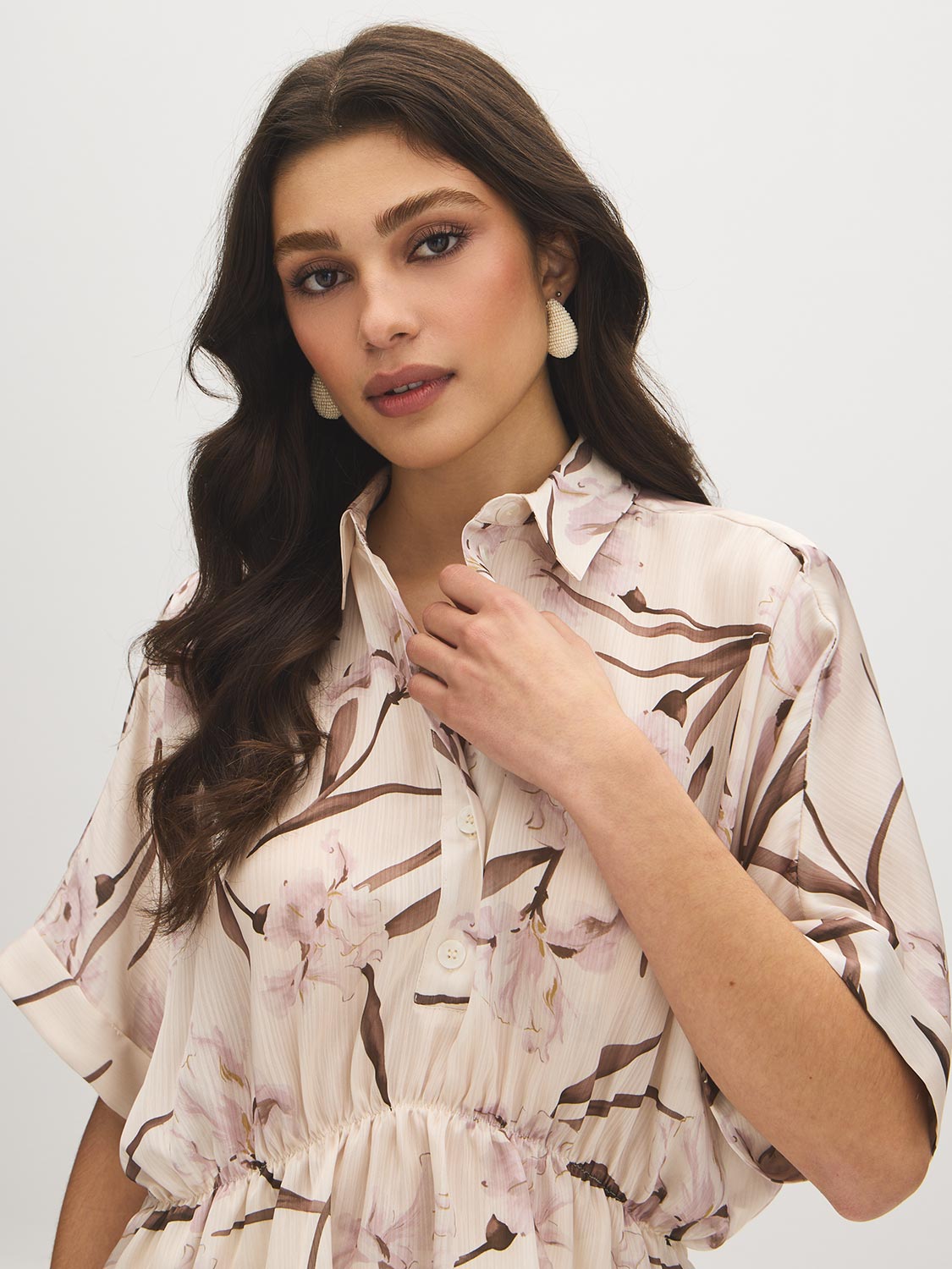 Printed Dolman Sleeve Peplum Blouse