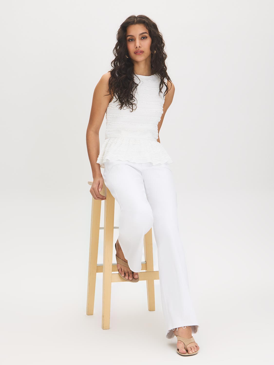 Sleeveless Textured Peplum Top